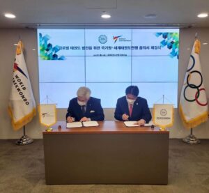 Assinatura de acordo entre a WT - World Taekwondo e o Kukkiwon